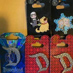 Assorted Disney pins on original cards